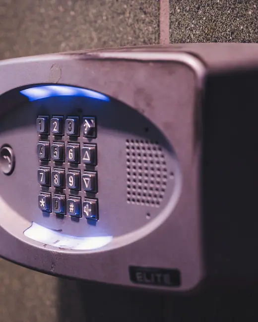 An illuminated keypad lock on a door